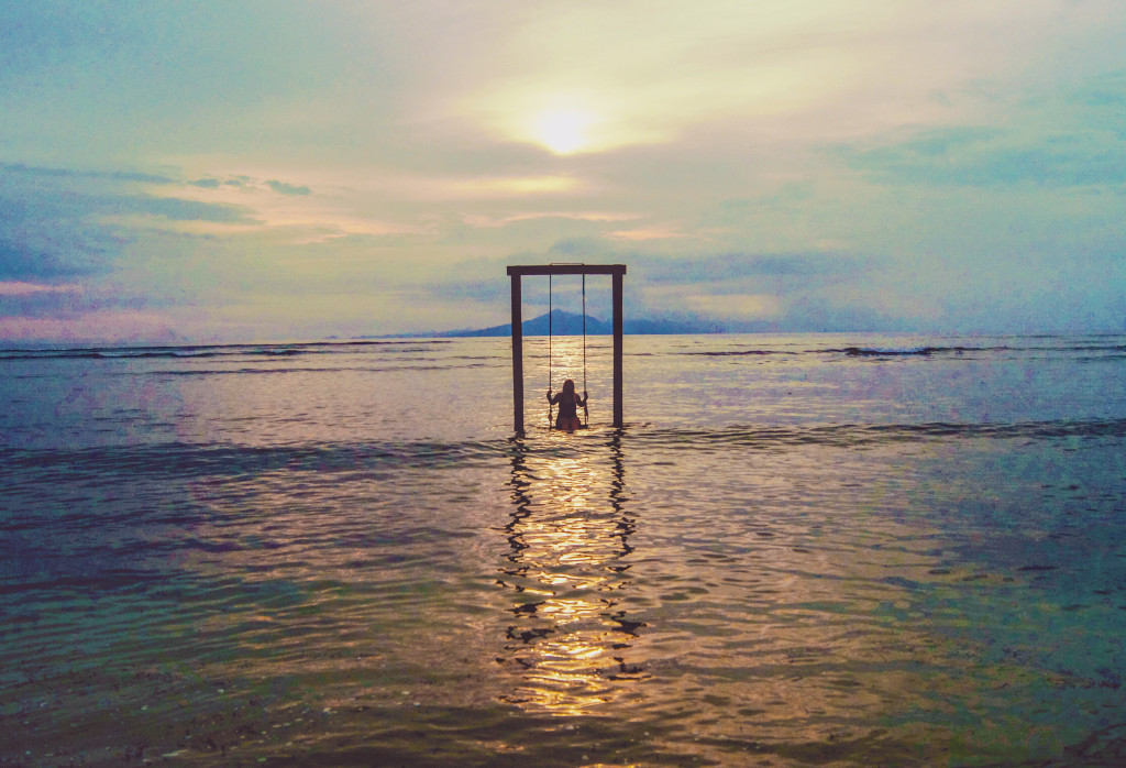 Gili Trawangan, Indonesia: sunset on a swing.